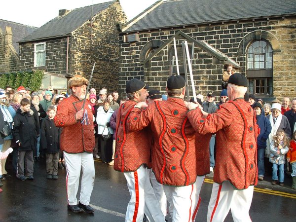 Description: The final figure of the Grenoside Sword Dance. Author/Uploader - photo by Gerry Bates Date/Place: 27 December 2004/Grenoside Village